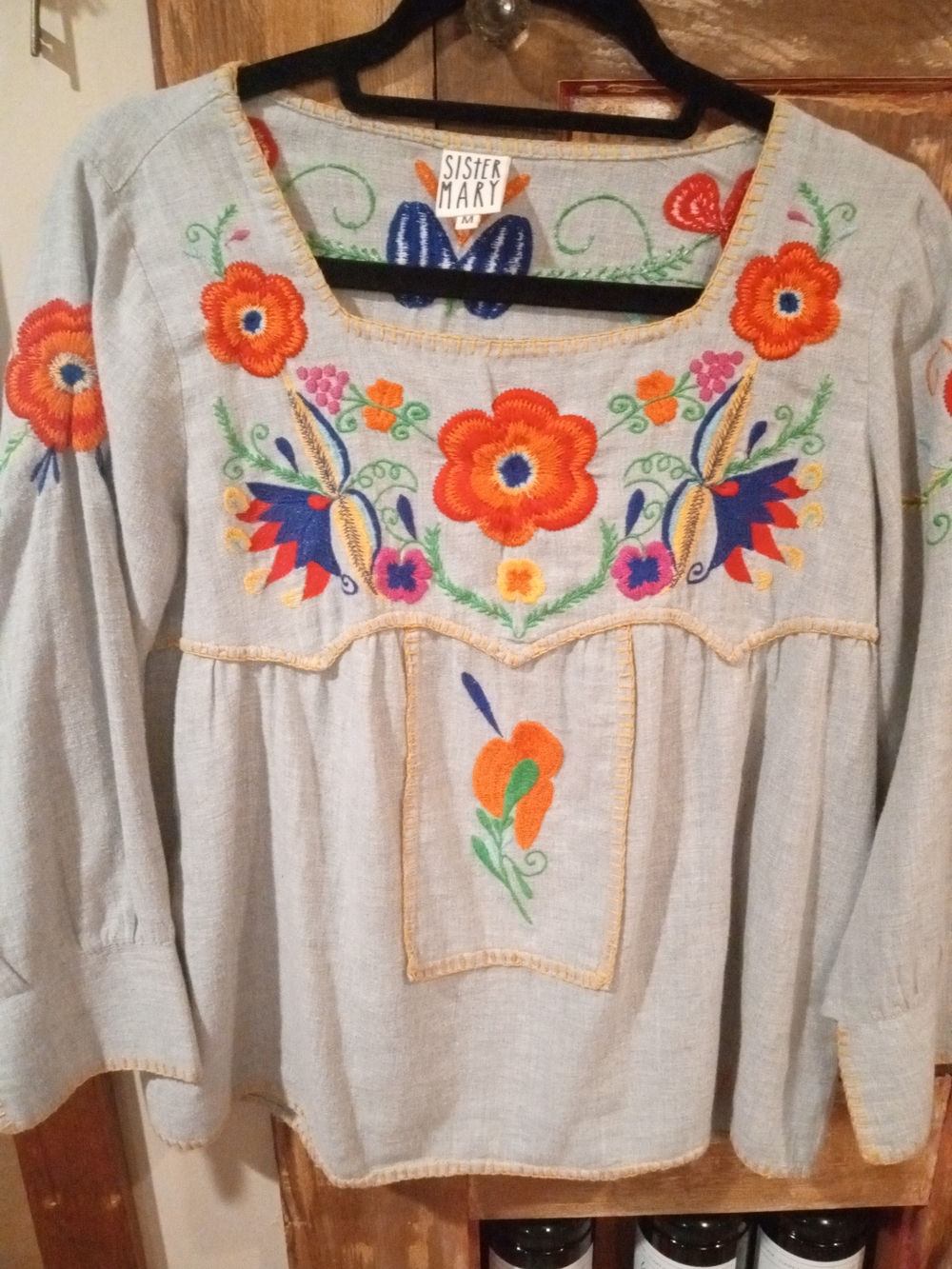 Sister Mary Women's Embroidered Light Blue Tunic with Orange Floral Accents